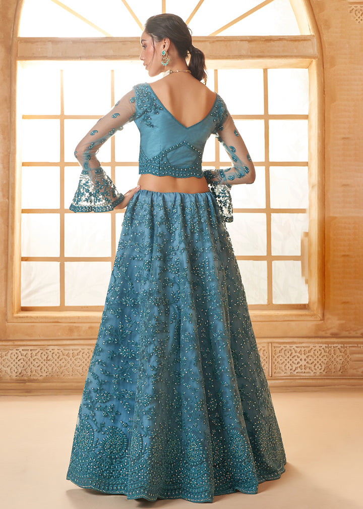 Buy Now Awesome Blue Heavy Net Embroidered Bridal Lehenga Choli Online in USA, UK, France, UAE & Worldwide at Empress Clothing. 