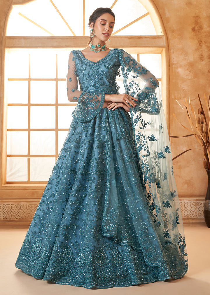 Buy Now Awesome Blue Heavy Net Embroidered Bridal Lehenga Choli Online in USA, UK, France, UAE & Worldwide at Empress Clothing. 