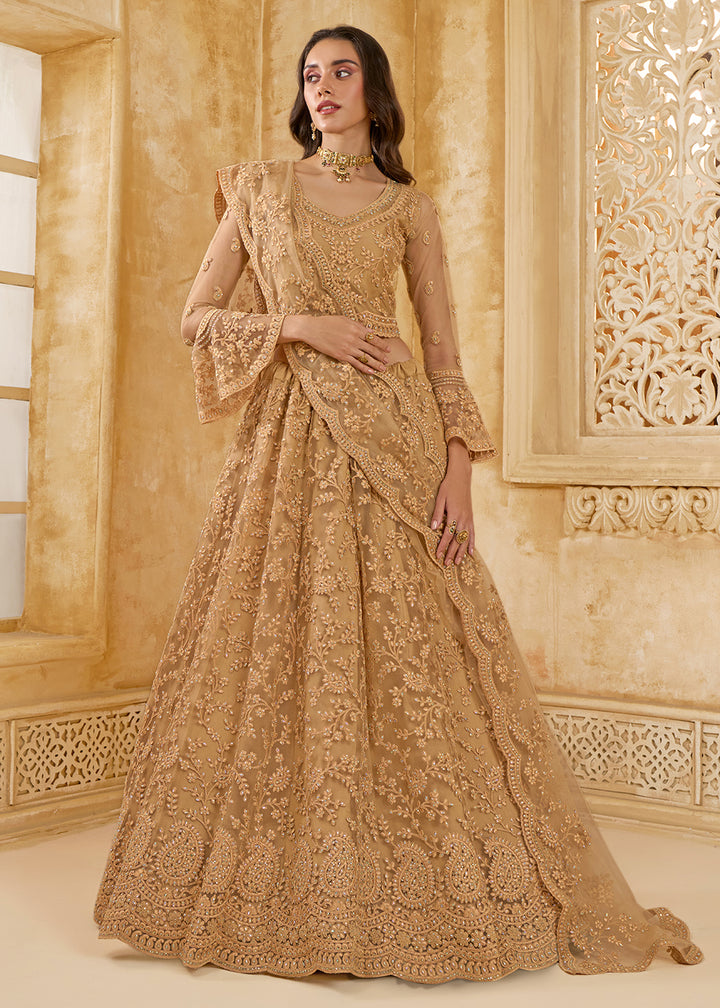 Buy Now Awesome Golden Heavy Net Embroidered Bridal Lehenga Choli Online in USA, UK, France, UAE & Worldwide at Empress Clothing.