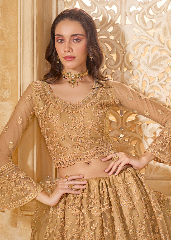 Buy Now Awesome Golden Heavy Net Embroidered Bridal Lehenga Choli Online in USA, UK, France, UAE & Worldwide at Empress Clothing.