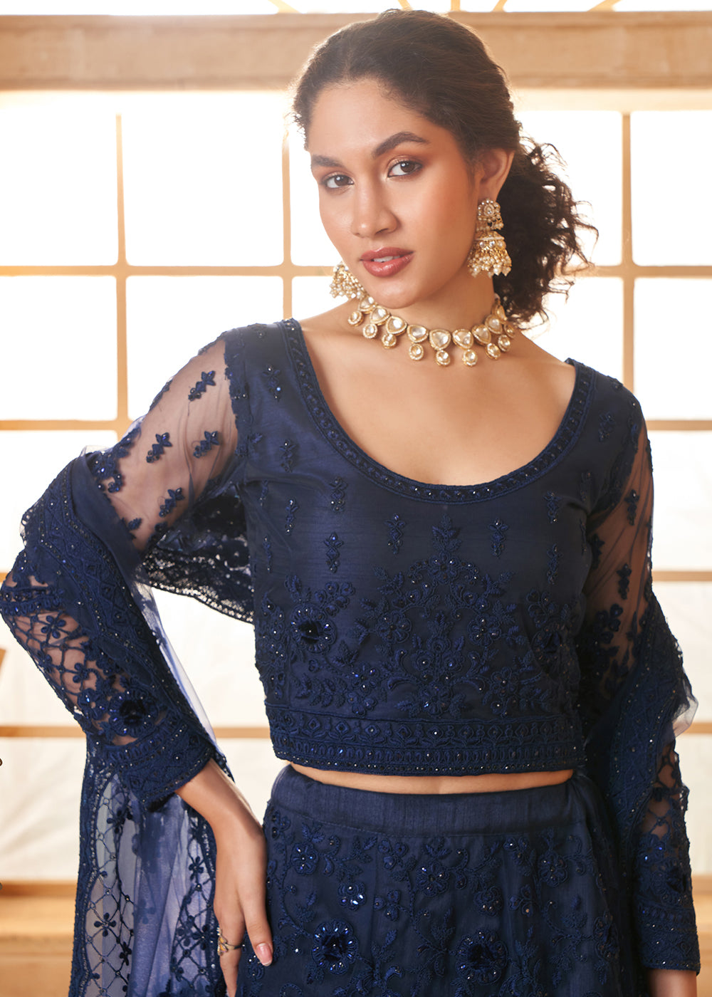 Buy Now Stunning Blue Heavy Net Embroidered Bridal Lehenga Choli Online in USA, UK, France, UAE & Worldwide at Empress Clothing. 