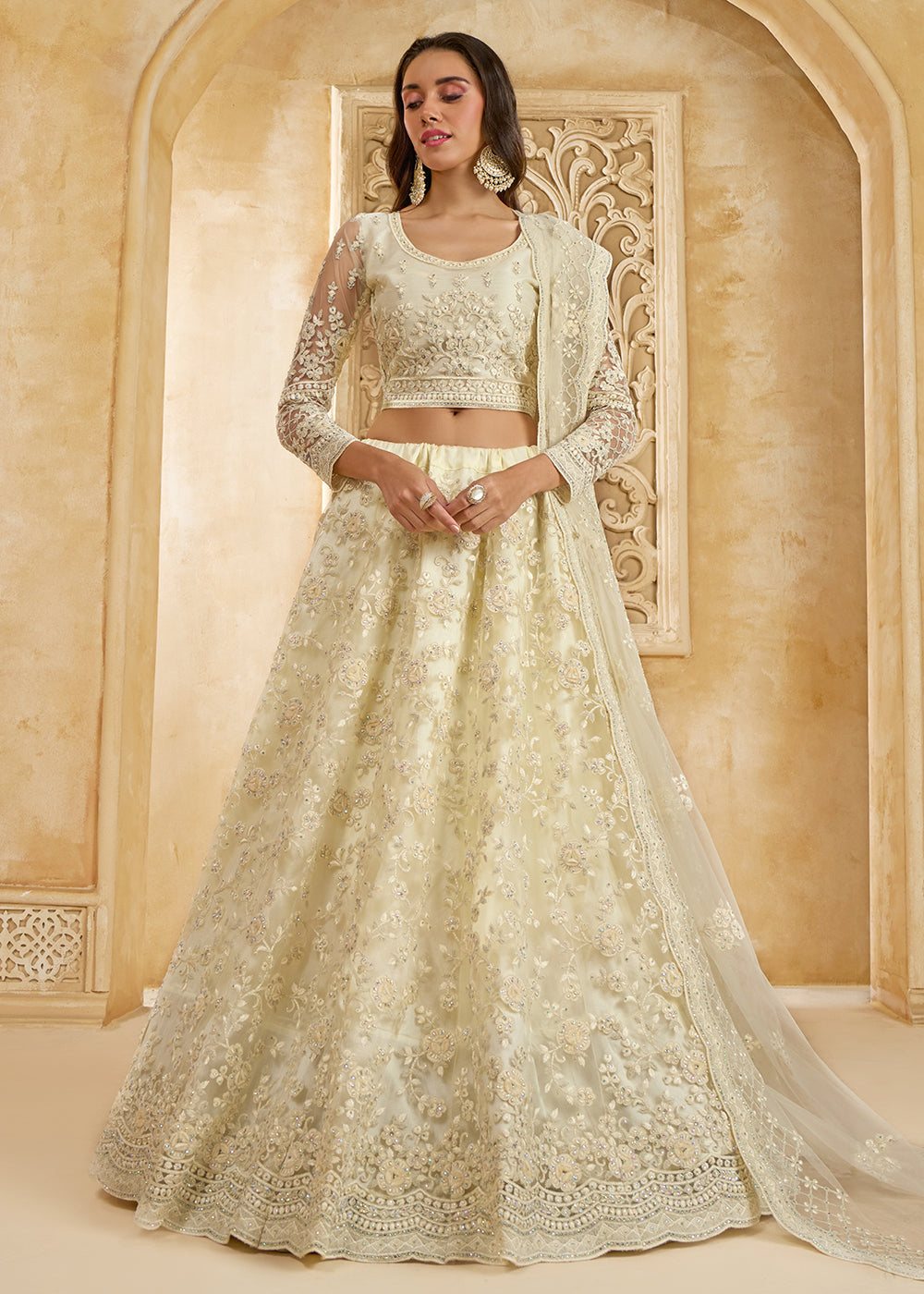 Buy Now Stunning Cream Heavy Net Embroidered Bridal Lehenga Choli Online in USA, UK, France, UAE & Worldwide at Empress Clothing.