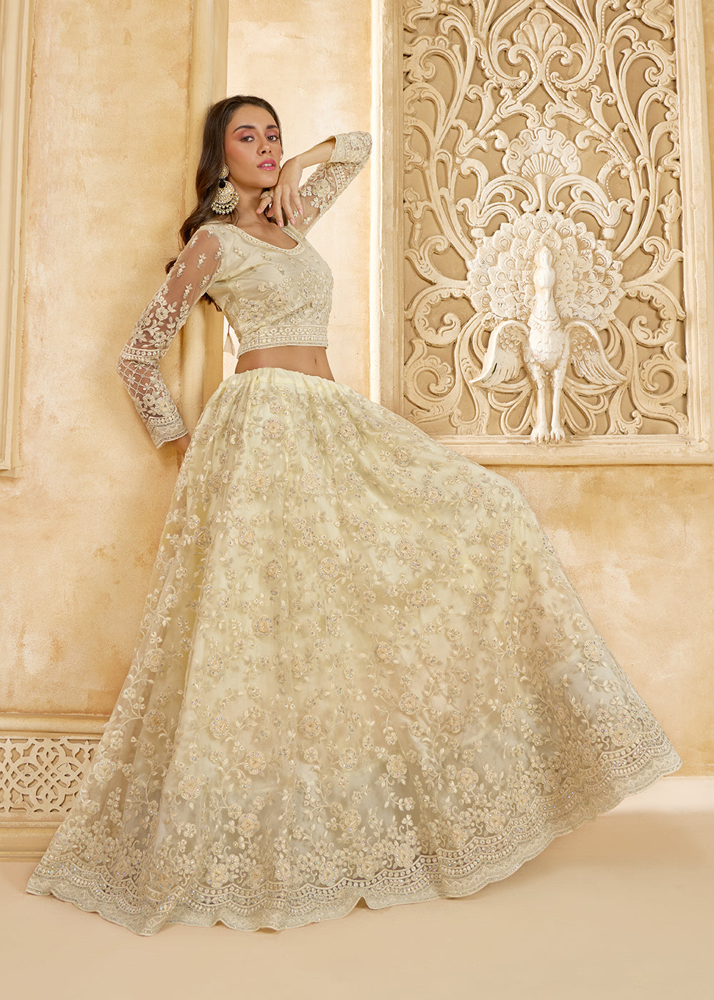 Buy Now Stunning Cream Heavy Net Embroidered Bridal Lehenga Choli Online in USA, UK, France, UAE & Worldwide at Empress Clothing.