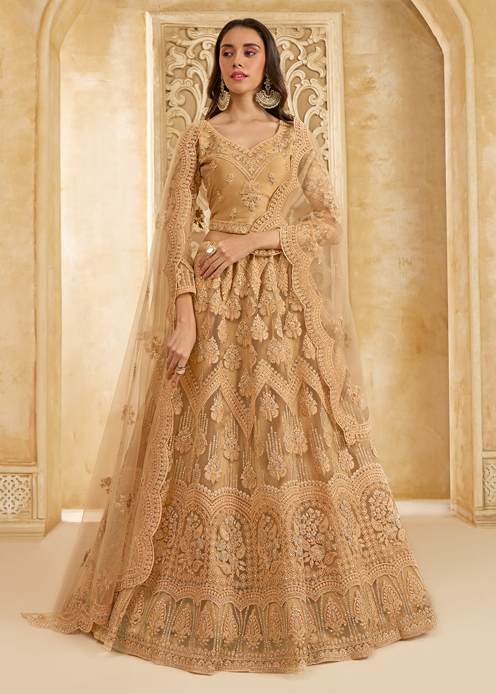 Buy Now Gorgeous Golden Heavy Net Embroidered Bridal Lehenga Choli Online in USA, UK, France, UAE & Worldwide at Empress Clothing. 