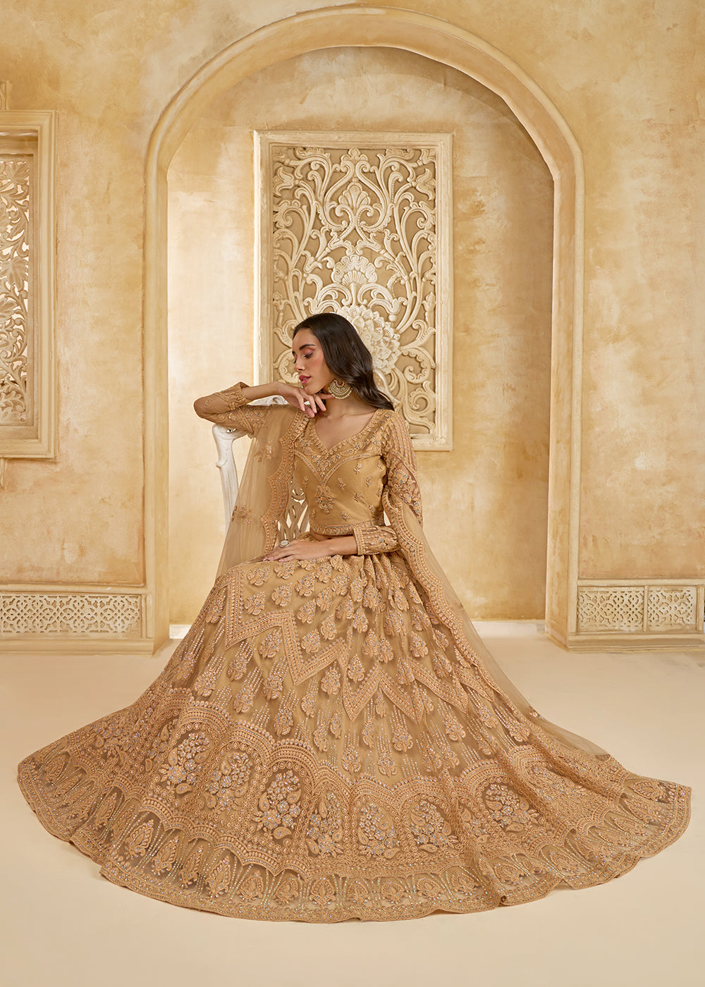 Buy Now Gorgeous Golden Heavy Net Embroidered Bridal Lehenga Choli Online in USA, UK, France, UAE & Worldwide at Empress Clothing. 