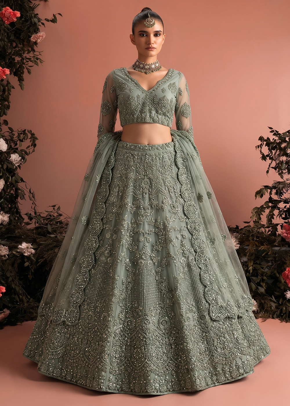Buy Now Sage Green Butterfly Net Heavy Wedding Style Lehenga Choli Online in US, UK, Canada, France, Italy, Germany, Australia, Greece & Worldwide at Empress.