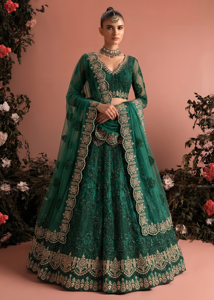Buy Now Dark Green Butterfly Net Heavy Wedding Style Lehenga Choli Online in US, UK, Canada, France, Italy, Germany, Australia, Greece &amp; Worldwide at Empress.