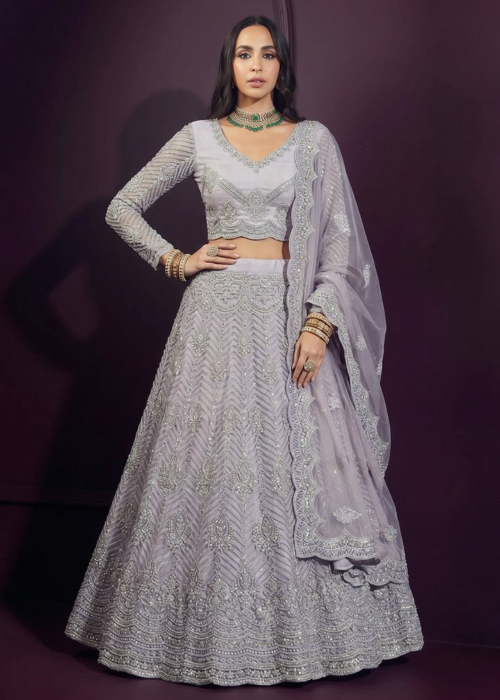 Buy Now Pastrel Lilac Net Embroidered Bridesmaids Lehenga Choli Online in US, UK, Canada, France, Italy, Greece, Sweden, Netherlands, UAE &amp; Worldwide at Empress