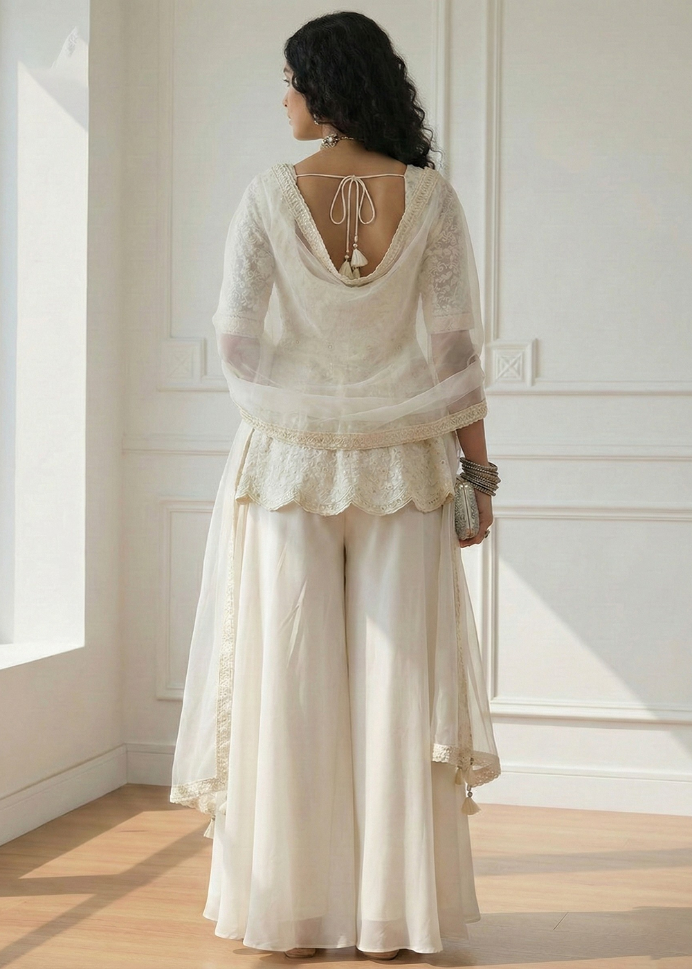 Shop Now Georgette Spectacular Off White Peplum Style Sharara Suit Online at Empress in USA, UK, Canada, Italy, Germany, France, Greece, UAE & Worldwide.