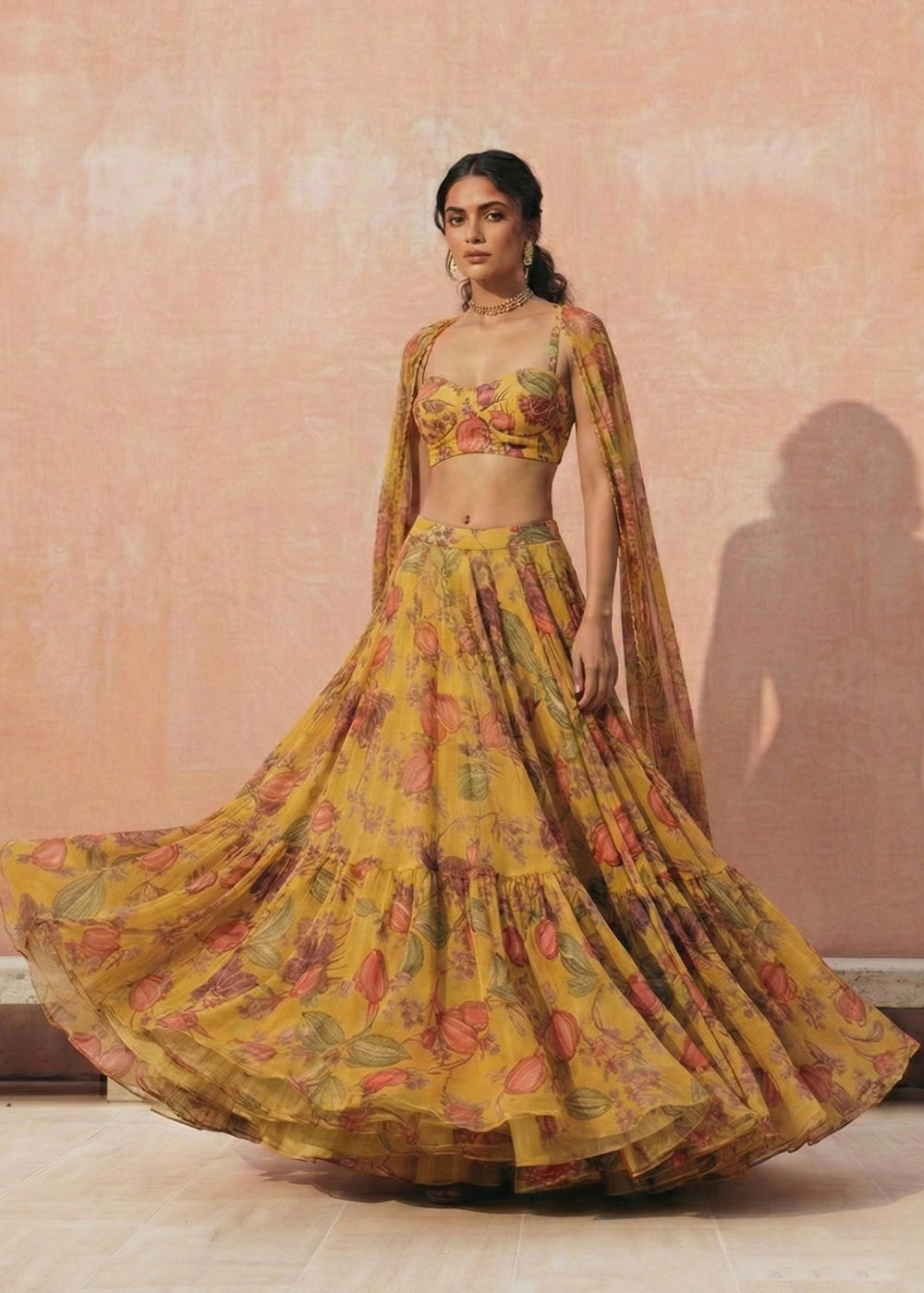 Buy Now Floral Printed Yellow Georgette Crop Top Lehenga Choli Online in US, UK, Canada, France, Germany, Sweden, Greece, Denmark, UAE & Worldwide at Empress.