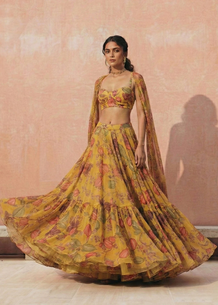 Buy Now Floral Printed Yellow Georgette Crop Top Lehenga Choli Online in US, UK, Canada, France, Germany, Sweden, Greece, Denmark, UAE & Worldwide at Empress.
