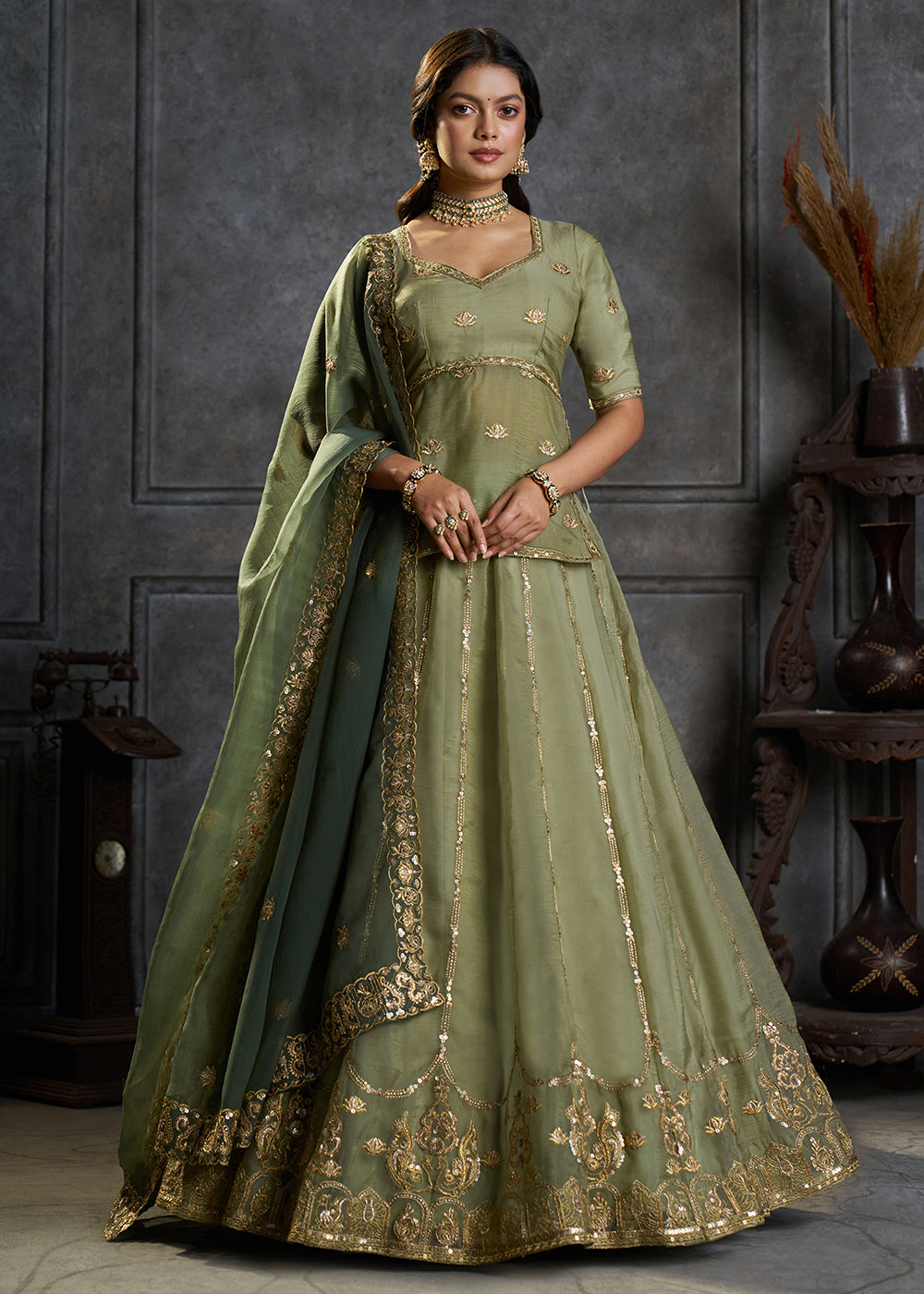 Shop Now Fancy Green Organza Embroidery Designer Lehenga Choli Online in USA, UK, Canada, France, Germany, Spain, Austria, Sweden, UAE & Worldwide at Empress.