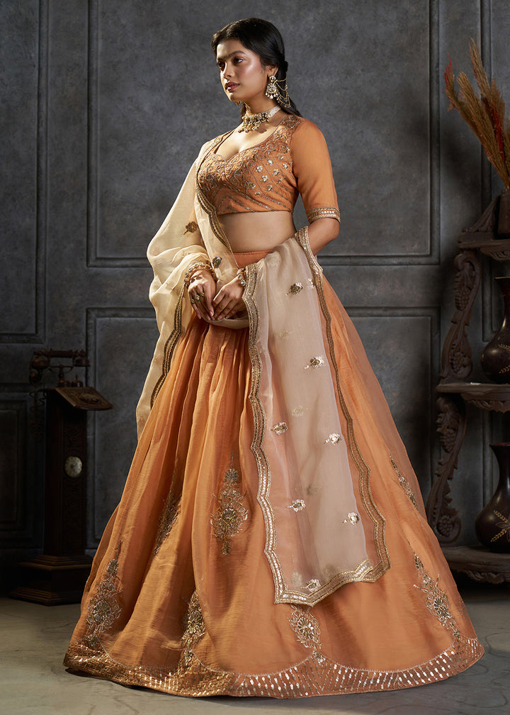 Shop Now Fancy Orange Organza Embroidery Designer Lehenga Choli Online in USA, UK, Canada, France, Germany, Spain, Austria, Sweden, UAE &amp; Worldwide at Empress.
