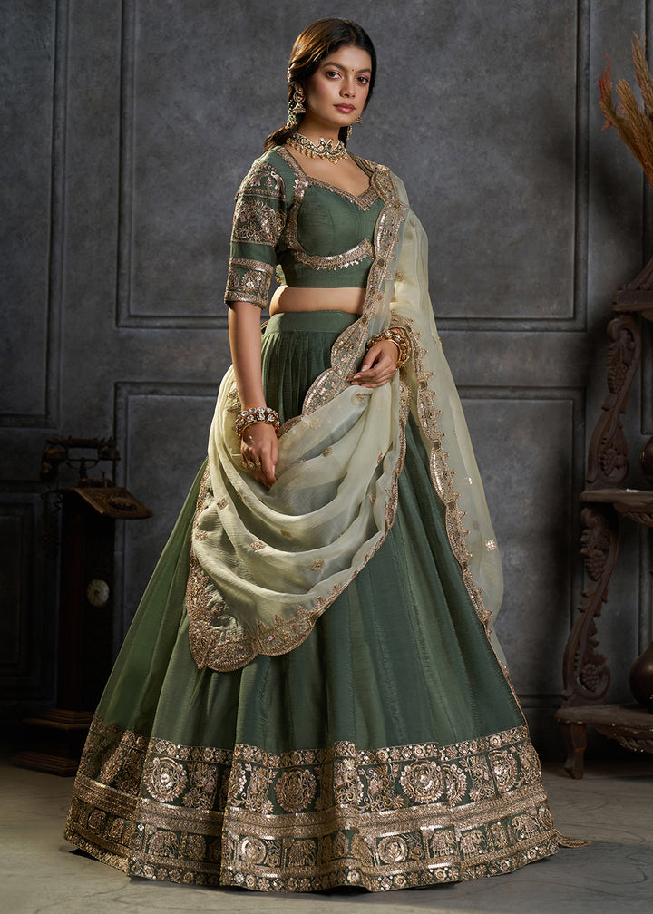 Shop Now Fancy Green Organza Embroidery Designer Lehenga Choli Online in USA, UK, Canada, France, Germany, Spain, Austria, Sweden, UAE &amp; Worldwide at Empress.