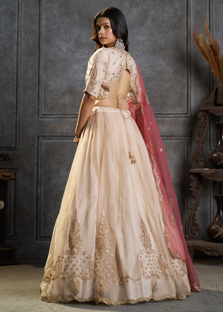 Shop Now Fancy Ivory Organza Embroidery Designer Lehenga Choli Online in USA, UK, Canada, France, Germany, Spain, Austria, Sweden, UAE &amp; Worldwide at Empress.