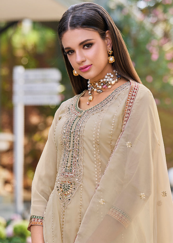 Buy Now Beige Dhoti Style Embroidered Organza Punjabi Style Suit Online in USA, UK, Canada, Germany, Australia & Worldwide at Empress Clothing. 