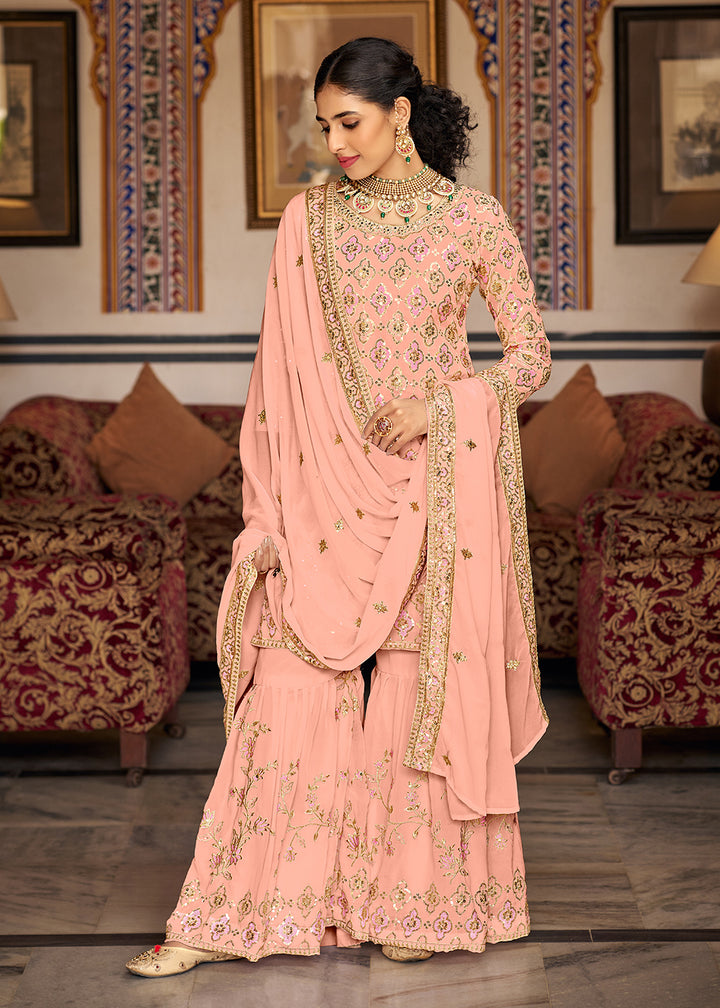 Shop Now Heavy Georgette Peach Sequins Embroidered Gharara Suit Online at Empress Clothing in USA, UK, Canada, Italy & Worldwide.