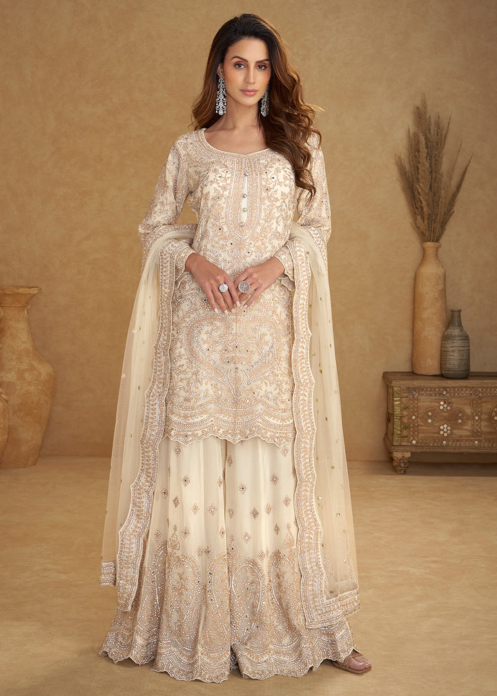 Buy Now Net Off White Embroidered Eid Wear Palazzo Suit Online in New York, Las Vegas, Newark, Chicago, Houston, Fremont, Dubai, Utah & Worldwide at Empress.