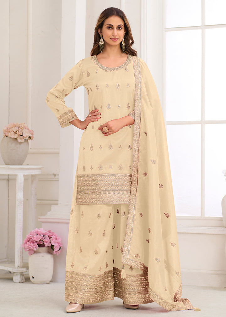 Buy Now Real Shimmer Silk Cream Embroidered Palazzo Style Dress Online in US, UK, Canada, Netherlands, Germany, Italy, France, Sweden & Worldwide at Empress.