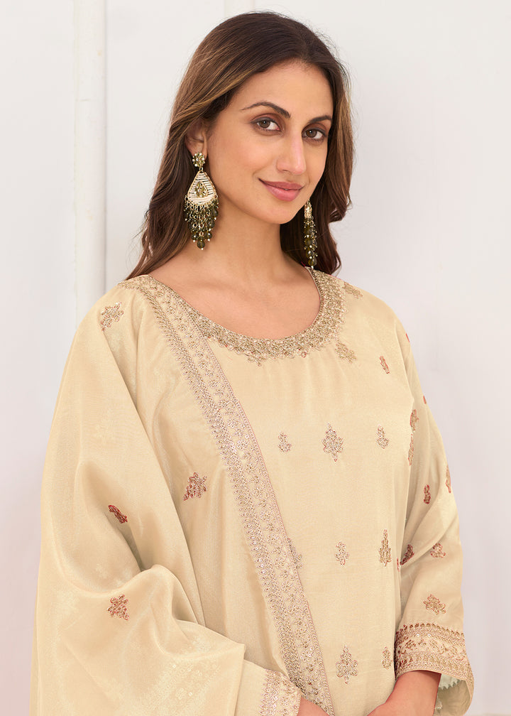 Buy Now Real Shimmer Silk Cream Embroidered Palazzo Style Dress Online in US, UK, Canada, Netherlands, Germany, Italy, France, Sweden & Worldwide at Empress.