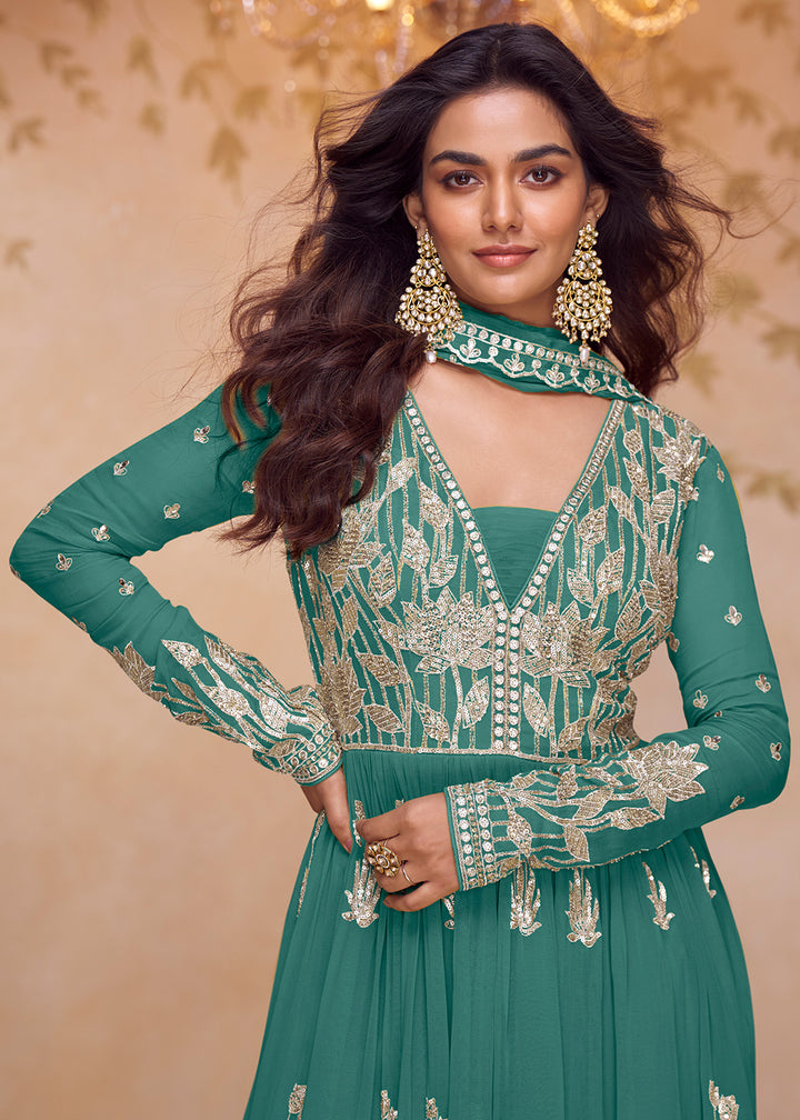 Buy Now Real Chinnon Festive Style Green Palazzo Style Suit Online in US, UK, Canada, Netherlands, Germany, Italy, France, Sweden, UAE & Worldwide at Empress.