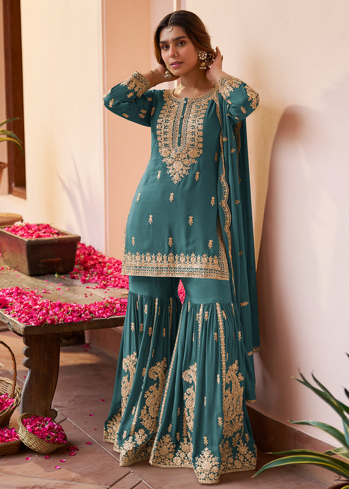 Shop Now Real Chinnon Teal Blue Embroidered Festive Gharara Suit Online at Empress in US, UK, Canada, Germany, Australia, Sweden, Denmark, Africa & Worldwide.