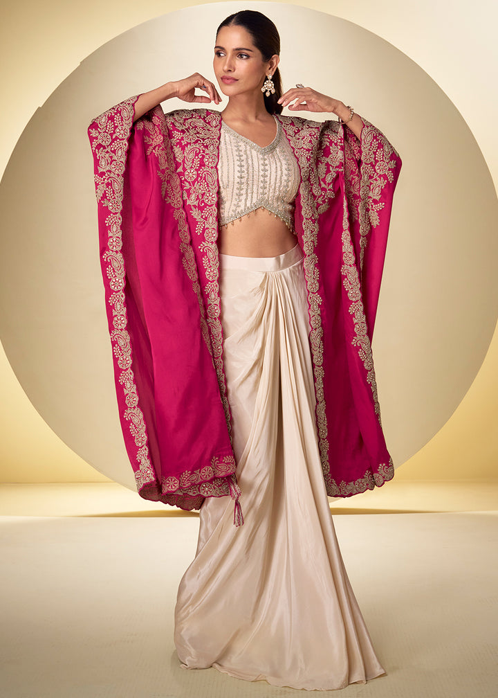 Buy Now Ivory Cream Dhoti Style Indo Western Dress with Pink Shrug Online in US, UK, Canada, Netherlands, Germany, Italy, France, Greece &amp; Worldwide at Empress.