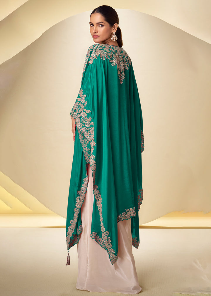 Buy Now Ivory Cream Dhoti Style Indo Western Dress with Teal Shrug Online in US, UK, Canada, Netherlands, Germany, Italy, France, Greece &amp; Worldwide at Empress.