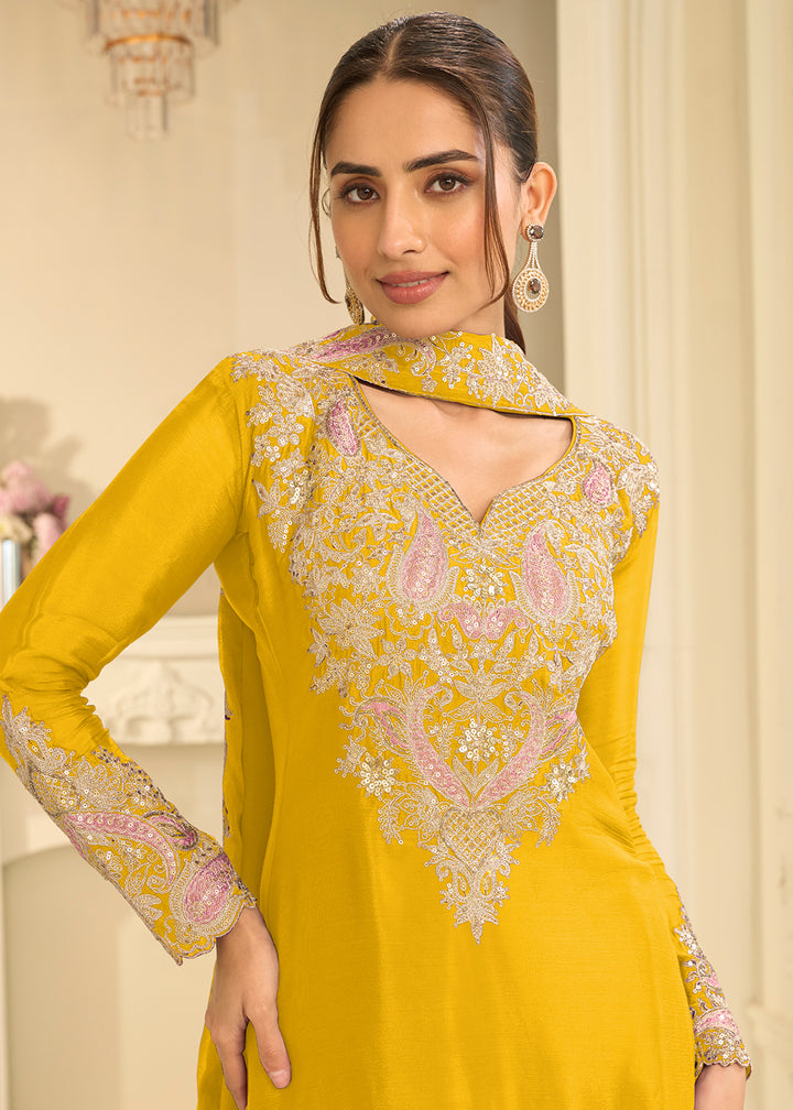 Shop Now Yellow Real Chinnon Festive Gharara Style Suit Online at Empress in US, UK, Canada, Italy, Germany, France, Greece, Sweden, UAE, Austria &amp; Worldwide.