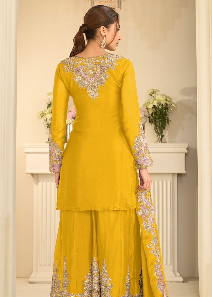 Shop Now Yellow Real Chinnon Festive Gharara Style Suit Online at Empress in US, UK, Canada, Italy, Germany, France, Greece, Sweden, UAE, Austria &amp; Worldwide.