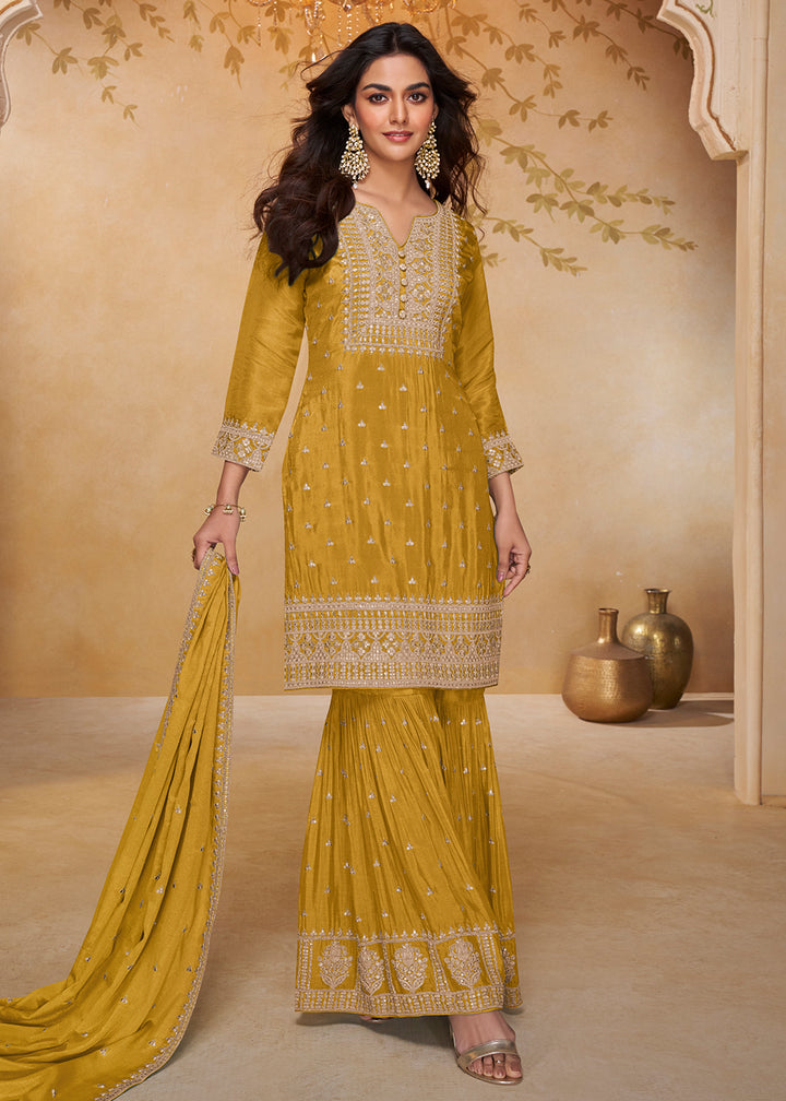 Shop Now Mustard Real Chinnon Embroidered Gharara Style Dress Online at Empress in US, UK, Canada, Italy, Germany, France, Greece, Sweden, Denmark &amp; Worldwide.