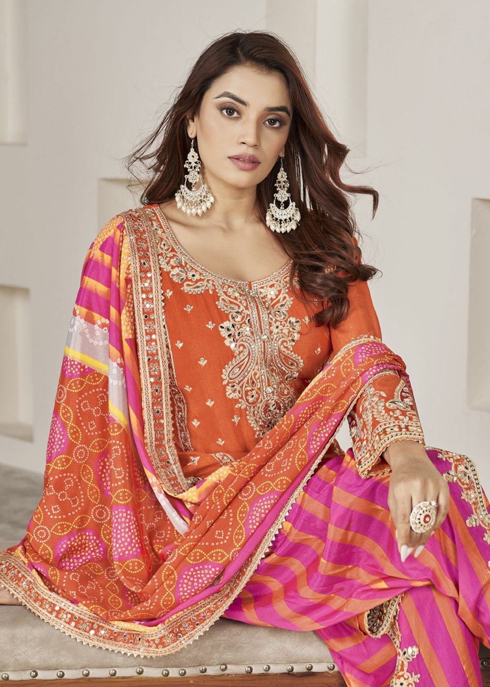 orange punjabi dress Radiance in Tradition , Step into elegance with this stunning boutique Punjabi suit a perfect blend of vibrant orange hues, intricate prints, and timeless charm. A must-have for festive and