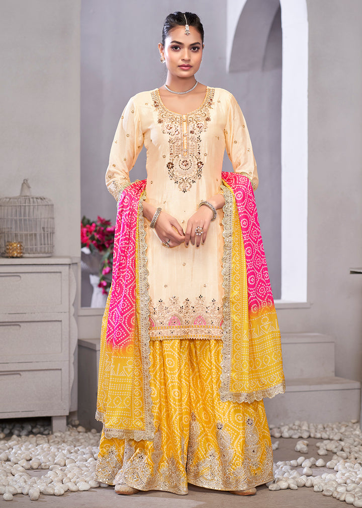 Buy Now Cream & Yellow Dabka Dori Work Ethnic Sharara Suit Online in USA, UK, Canada, Germany, Italy, France, Austria, Denmark, UAE & Worldwide at Empress.