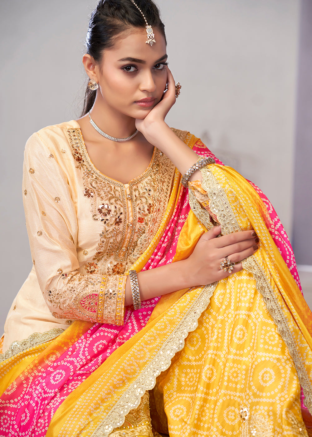 Buy Now Cream & Yellow Dabka Dori Work Ethnic Sharara Suit Online in USA, UK, Canada, Germany, Italy, France, Austria, Denmark, UAE & Worldwide at Empress.
