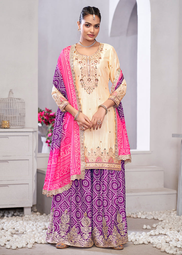 Buy Now Cream & Purple Dabka Dori Work Ethnic Sharara Suit Online in USA, UK, Canada, Germany, Italy, France, Austria, Denmark, UAE & Worldwide at Empress.
