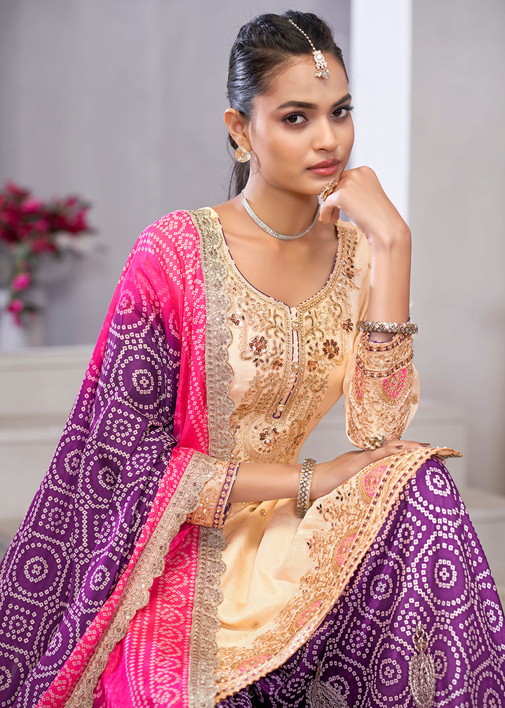 Buy Now Cream & Purple Dabka Dori Work Ethnic Sharara Suit Online in USA, UK, Canada, Germany, Italy, France, Austria, Denmark, UAE & Worldwide at Empress.