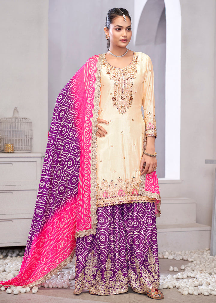 Buy Now Cream & Purple Dabka Dori Work Ethnic Sharara Suit Online in USA, UK, Canada, Germany, Italy, France, Austria, Denmark, UAE & Worldwide at Empress.