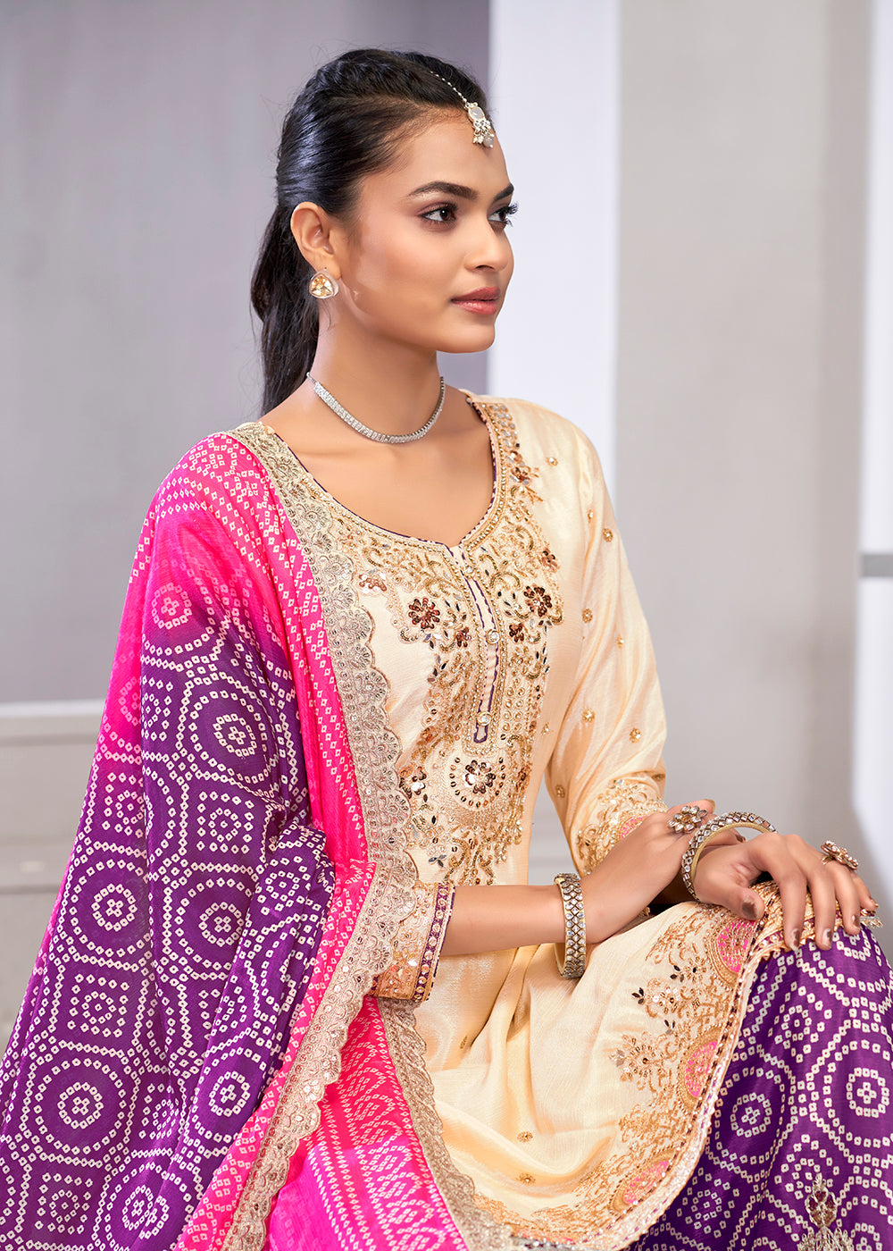 Buy Now Cream & Purple Dabka Dori Work Ethnic Sharara Suit Online in USA, UK, Canada, Germany, Italy, France, Austria, Denmark, UAE & Worldwide at Empress.