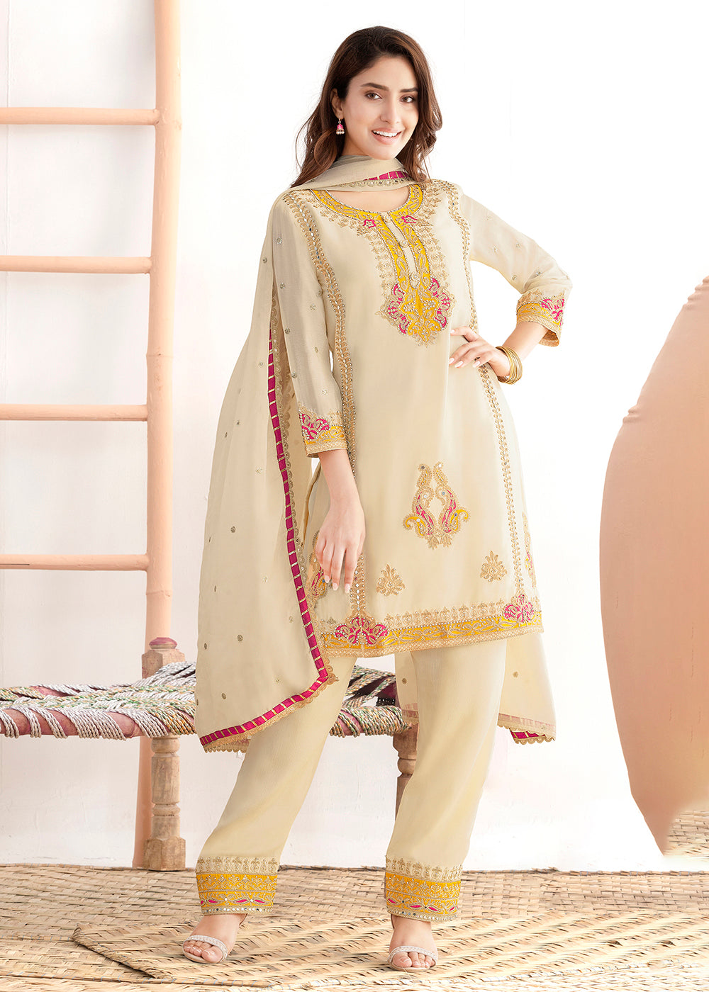 Buy Now Cream Beautiful Applique Style Festive Wear Dress Online in New York, Las Vegas, Newark, Chicago, Houston, Fremont, Dubai, Utah & Worldwide at Empress.