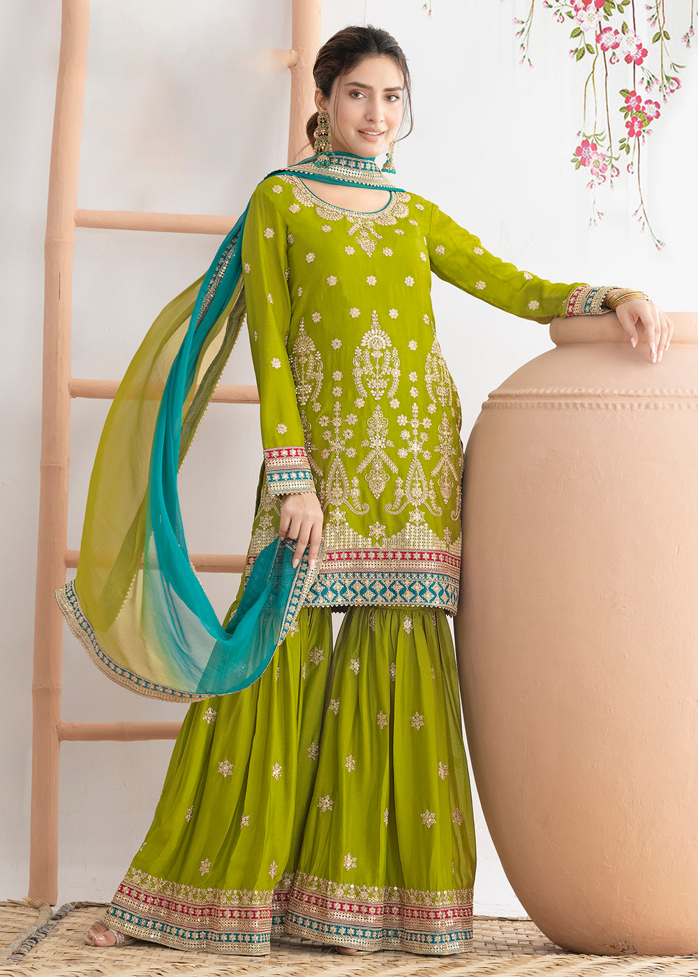Buy Now Green Beautiful Dabka Dori Gharara Style Suit Online in USA, UK, Canada, Germany, Italy, France, Austria, Denmark, Netherlands & Worldwide at Empress.