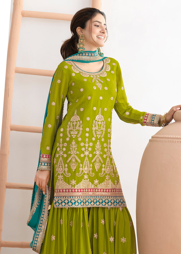 Buy Now Green Beautiful Dabka Dori Gharara Style Suit Online in USA, UK, Canada, Germany, Italy, France, Austria, Denmark, Netherlands & Worldwide at Empress.