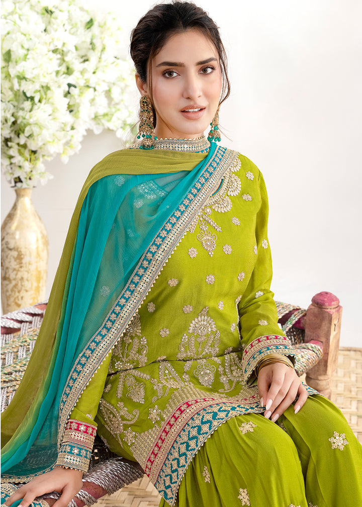 Buy Now Green Beautiful Dabka Dori Gharara Style Suit Online in USA, UK, Canada, Germany, Italy, France, Austria, Denmark, Netherlands & Worldwide at Empress.
