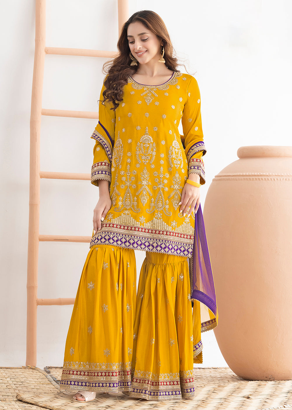 Buy Now Yellow Beautiful Dabka Dori Gharara Style Suit Online in USA, UK, Canada, Germany, Italy, France, Austria, Denmark, Netherlands & Worldwide at Empress.