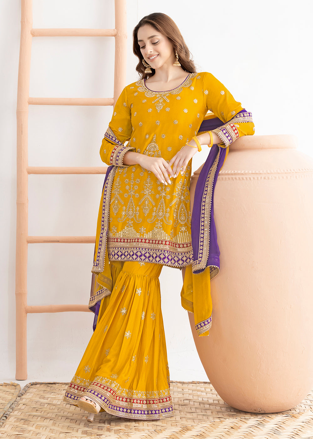 Buy Now Yellow Beautiful Dabka Dori Gharara Style Suit Online in USA, UK, Canada, Germany, Italy, France, Austria, Denmark, Netherlands & Worldwide at Empress.