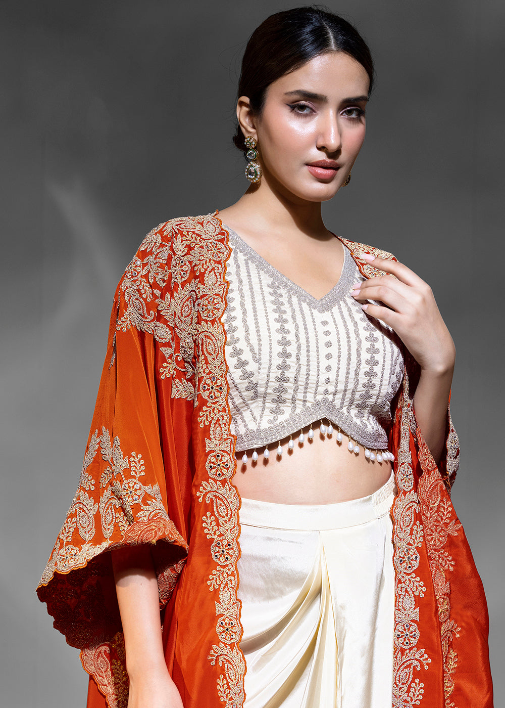 Buy Now Pretty Cream Cowl Style Skirt Dress with Orange Shurg Online in New York, Los Angeles, San Jose, Chicago, Houston, Fremont, Utah & Worldwide at Empress.