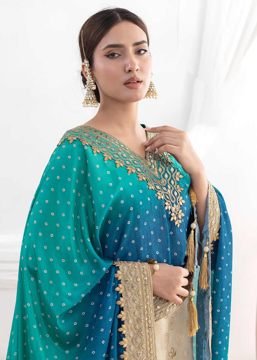 Shop Now Cream & Teal Embroidered Kaftan Style Gharara Dress Online at Empress in US, UK, Canada, Germany, Australia, Sweden, Denmark, UAE, Qatar & Worldwide.