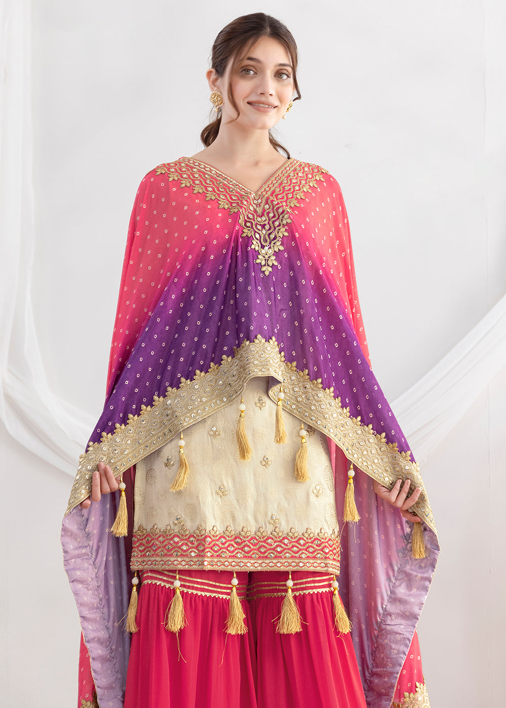 Shop Now Cream & Pink Embroidered Kaftan Style Gharara Dress Online at Empress in US, UK, Canada, Germany, Australia, Sweden, Denmark, UAE, Qatar & Worldwide.