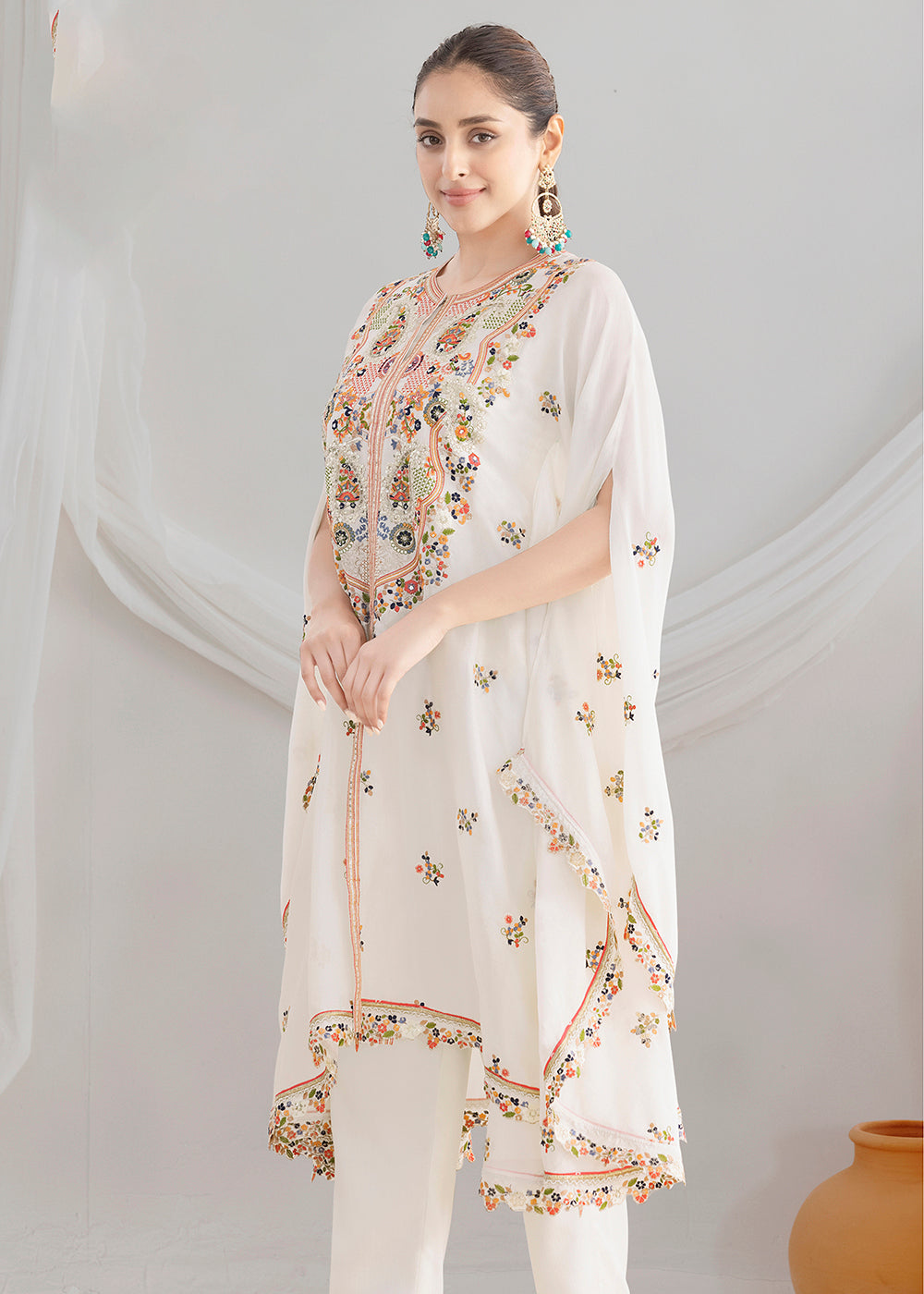 Buy Now White Floral Embroidered Kaftan Style Dress Online in US, UK, Canada, Germany, Italy, France, Austria, Australia, Denmark, UAE & Worldwide at Empress.
