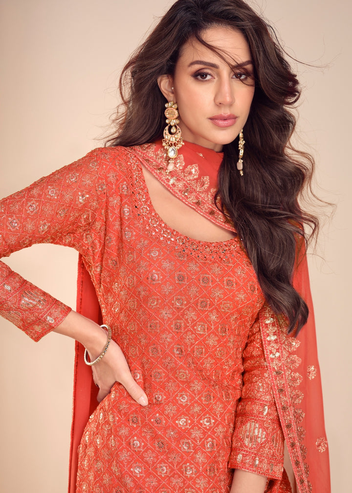 Shop Now Coral Orange Georgette Gharara Style Festive Dress Online at Empress in USA, UK, Canada, Italy, Germany, France, Greece, Sweden, UAE & Worldwide.