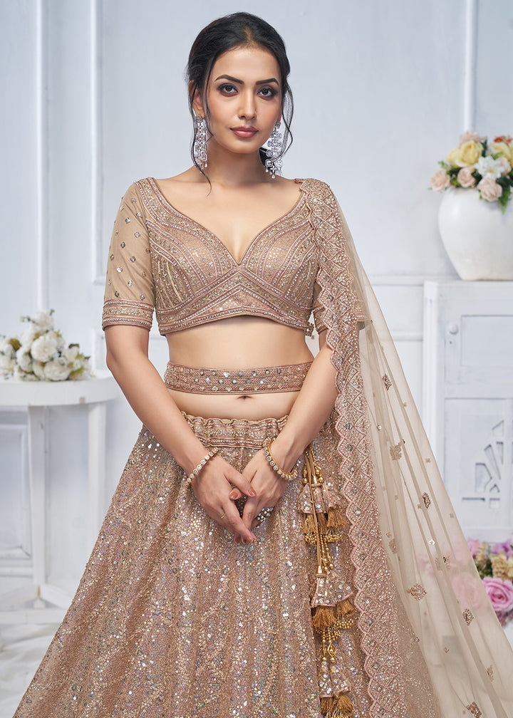 Buy Now Alluring Brown Heavy Embroidered Bridesmaids Lehenga Choli Online in USA, UK, France, UAE & Worldwide at Empress Clothing. 